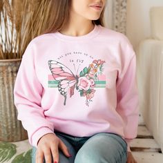 Womens Graphic Butterfly Sweatshirt with Positive Motivational/Inspirational Words Looking for more kindness and inspirational tees and sweatshirts? Check these out: https://www.etsy.com/shop/TheGraphicPeach?ref=seller-platform-mcnav§ion_id=30193152 Our shop uses direct-to-garment printing to make our products. The design ink is sprayed on, then allowed to soak into the fibers of the garment. This process yields fine quality prints and a smooth finish on the garment. GILDAN UNISEX CREW NECK SWEA Inspirational Pink Crew Neck Top, Graphic Butterfly, Butterfly Sweatshirt, Sweatshirts Hoodie Women, Fiesta Shirt, Boho Sweatshirt, Flower Sweatshirt, Hoodie Cozy, Heart Hoodie