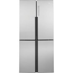 a silver refrigerator freezer sitting on top of a white wall