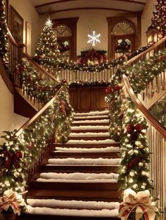 stairs decorated with christmas lights and garlands