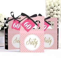 three pink and black gift bags with the numbers thirteen thirteen thirteen thirteen thirteen thirteen thirteen thirteen thirteen