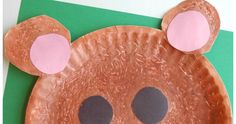 a paper plate shaped like a bear's head