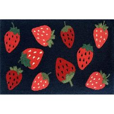 the rug has strawberries on it