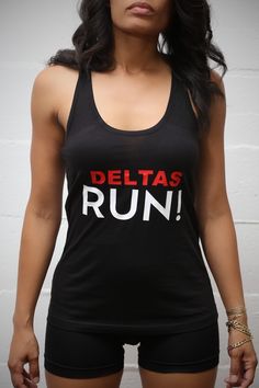 You remember what it took for you to get your letters, right? Well that means running is no big deal! So next time you go out and hit the pavement, let the world know who you are and what you represent. Let them know eating a few miles is no big deal compared to the commitment you gave and continue to give to be in your phenomenal sorority! Let everyone know... You RUN! 100% Cotton Machine wash cold, tumble dry. Model is a size 2, stands 5'4" tall @ 112 lbs and is wearing Small. Perfect for thos Black Logo Print Tank Top For Streetwear, Black Running Tops With Letter Print, Racerback Tank Top With Letter Print For Streetwear, Black Letter Print Top For Running, Black Tops With Letter Print For Running, Black Letter Print Athleisure Tank Top, Black Tank Activewear For Streetwear, Black Sleeveless Tank Top With Text Print, Black Text Print Sleeveless Tank Top