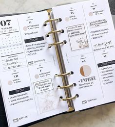 a planner is open on top of a table