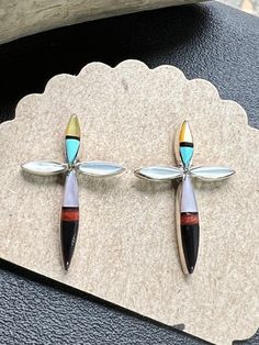 These are a beautiful handcrafted pair of Zuni earrings.  They're multi stone, set in Sterling Silver & SIGNED on the back 'LR' & Sterling.  They measure 25mm x 18mm & will be a memorable gift for someone special this Holiday Season. Please look at all the photos carefully. Welcome to NorthWestTradingCo. Inlay Dangle Earrings For Gift, Dangle Inlay Earrings For Gifts, Dangle Earrings With Inlay For Gift, Unique Multi-stone Earrings For Gift, Gift Dangle Earrings With Inlay, Multicolor Multi-stone Teardrop Earrings, Unique Multicolor Sterling Silver Earrings, Unique Multicolor Gemstone Earrings, Unique Multi-stone Drop Earrings