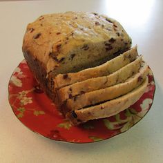 a loaf of bread sitting on top of a red plate