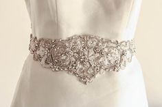 buy wedding sash online, Franc bridal sash in white Unique Wedding Belt Bridal Sash, Luxury Embellished Sashes For Wedding, Wedding Dress With Bling Belt, Lace Bride Sash, Wedding Belts And Sashes Vintage, Sparkly Wedding Dress Belt, Wedding Dresses With Sparkly Belt, Bridal Belts And Sashes Fabric, Wedding Dresses With Bling