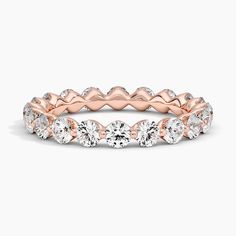 a rose gold and white diamond ring