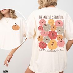 You will love our Comfort Colors fall Christian t-shirt for women. It is based on the Bible verse Matthew 9:37. This Comfort Colors tee comes in 6 beautiful fall colors, pepper, blue spruce, ivory, blossom, berry and denim. This is the perfect autumn top for any women to wear to fall festivals, the pumpkin patch or to a Thanksgiving gathering.   Comfort Colors T shirt Details: 100% ring-spun cotton Medium fabric (6.1 oz/yd² (206.8 g/m Relaxed fit Sewn-in twill label T shirt Care instructions: Ma Fall Tee Shirt Designs, Fall Christian Shirt Ideas, Christian Halloween Shirts, Christian Fall Shirts, Halloween T Shirt Design, Halloween T-shirt, Fall Tshirt Ideas, Fall Shirt Designs, Cute Christian Shirts