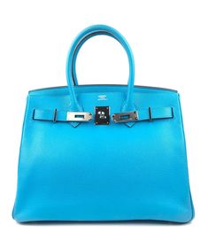 Description: Hermès birkin 30 blue aztec chèvre leather handbag Palladium hardware Protective plastic on hardware Excellent corners and structure Height: 9" Depth: 6" Length: 11.75" Details: Color: Blue AztecMaterial: Chèvre LeatherCondition: PristineBrand: Hermès Shipping: Standard: $9.95Expedited: $19.95 Blue Bags With Lock For Formal Occasions, Blue Everyday Bag With Lock, Blue Leather Bag With Lock, Blue Rectangular Bag With Metal Hardware, Luxury Blue Bag With Metal Hardware, Luxury Blue Bags With Metal Hardware, Blue Rectangular Bags With Metal Hardware, Luxury Blue Bags With Silver-tone Hardware, Blue Rectangular Bag With Silver-tone Hardware