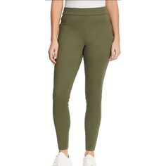 Nine West Ladies Heidi Pull On Pant Army Olive Green Size 4 An Easy And Stylish Choice When You Pull On The Heidi Pant. The Elastic Waistband Helps Make It Easy To Fit Your Body Comfortably For All Day Use. The High-Rise Helps Slim Parts Of The Body While Helping Make Your Legs Appear Longer. This Pull-On Jean Has The Look Of Five Pocket Styling But With Nonfunctional Faux Pockets, And The Fly In The Front For A Clean Finish. The Coin Pocket Has A Signature Nine West Logo Metal Bar. The Two Back Parts Of The Body, Pull On Jeans, Metal Bar, The Fly, Pull On Pants, Nine West, Olive Green, Pant Jumpsuit, Two By Two