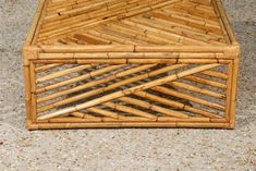 a coffee table made out of bamboo sticks