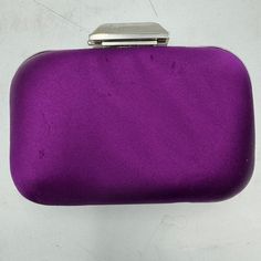 Description Cleverly Crafted To Fit Naturally In Your Hand, This Compact Minaudiere Is Exquisitely Structured With A Detachable Chain Strap And Features A Spacious Interior For All Of Your Day Or Night Essentials. The Cloud Clutch Exudes Effortless Glamour By Jimmy Choo. Details Satin Purple Tone Clasp Detachable, Made In Italy. Good Condition Working, With Minor Stein Inside And Scratches. No Return, See Pics For Detaills. Elegant Purple Clutch For Everyday Use, Formal Rectangular Box Bag With Magnetic Closure, Purple Clutch Shoulder Bag For Formal Occasions, Purple Clutch Evening Bag For Formal Occasions, Luxury Purple Rectangular Evening Bag, Formal Purple Clutch Shoulder Bag, Formal Purple Clutch Evening Bag, Elegant Purple Square Bag, Purple Rectangular Clutch For Formal Occasions