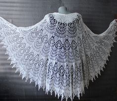 Cream shawl lace Bridal shawl wrap made with soft and cozy merino wool yarn in ivory(cream) color. *Handmade! *Size: lenght is about 35,4'' (90cm) width is about 78,7''(200cm) *Yarn: soft merino wool *Colours: ivory,black and other custom colours available Lightweight hand knitted shawl wrap is versatile item for any season and indispensable accessory for everyday life and for special occasions,is a perfect gift to friends or yourself This shawl has vintage vibe and looks great as a shawl cape with wedding gown in Victorian ,Boho,Gothic styles.You can made your own romantic style with this marvelous shawl! *Washing Instruction: I recommend gently hand wash in lukewarm or cold water with the addition of small amount of wool detergent.Lay flat to dry and block with pins if needed. Elegant Hand Knitted Cream Shawl, Hand Knitted White Shawl For Wedding, White Hand Knitted Shawl For Wedding, Handmade Lace Shawl In White, Handmade White Lace Shawl, One Size Wedding Shawl, Bohemian Hand Knitted Lace Shawl, Bohemian Cream Knitted Shawl, White Crochet One-size Shawl