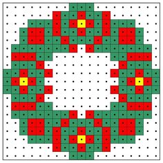 a cross stitch pattern with red, green and yellow squares in the shape of a snowflake