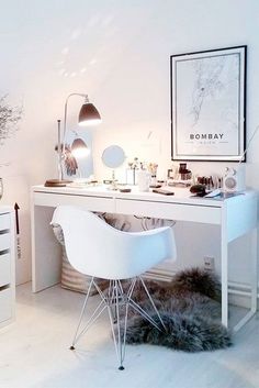 a white desk and chair in a room