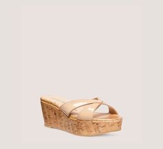 The Carmen Midi Platform Slide is set on a 75-mm cork wedge that offers a wearable lift while remaining lightweight and comfortable. With its sleek crossover straps, this sandal is designed to complement a range of warm-weather outfits.​ Heel Height: 2.4", 60 mm Platform Height: 1.2", 30 mm Slide sandal Cork wedge Round toe Patent leather Leather insole Leather outsole Spain Weather Outfits, Athleisure Dress, Warm Weather Outfits, Clog Sandals, Platform Slides, Beautiful Gift Wrapping, Sneaker Wedge, Sport Bag, Cork Wedge