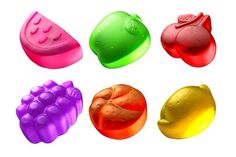 six different types of fruit shaped chocolates on a white background