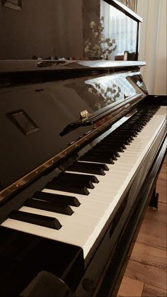 the piano is black and white in color