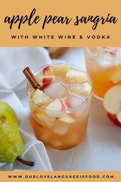 an apple pear sangria with white wine and vodka is shown in front of two glasses