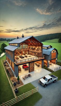 an aerial view of a house with a car parked in the driveway next to it