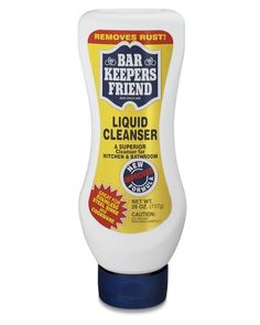 a bottle of liquid that is sitting on a white surface with the words, bar keepers friend