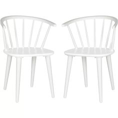 two white chairs sitting next to each other