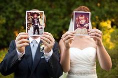 the bride and groom are holding up their wedding photos in front of them, with trees behind them