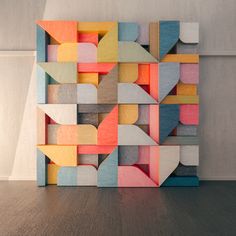 an art piece made out of different colored blocks