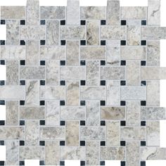 a white and black mosaic tile pattern