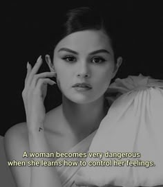 a woman is sitting down with her hand on her head and the caption reads, a woman becomes very dangerous when she learns how to control her feelings