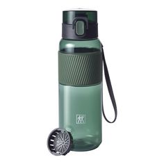 thermos bottle is green and has a black cap on it, with a handle