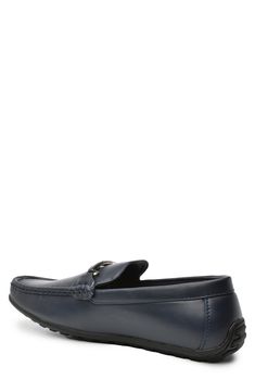 Debossed logo hardware with a polished finish brings stylish attitude to these slip-on loafers. Moc toe Slip-on style PU upper and lining, rubber sole Imported Classic Formal Loafers With Studded Rubber Outsoles, Formal Flat Loafers With Buckle Closure, Casual Workwear Loafers With Studded Outsoles, Loafers Men, Loafers, Slip On, Nordstrom, Navy, Bring It On