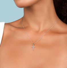 A solid gold Cross adorned with natural diamonds. Cross-shaped Diamond Necklace With Single Cut Diamonds, Silver Diamond Necklace With Round Cut, White 14k Gold Jewelry With Single Cut Diamonds, Timeless Silver Diamond Cut Necklace, Fine Jewelry White Gold Necklace With Diamond Accents, Timeless Silver Diamond Necklace With Vvs Clarity, White Gold Necklace With Diamond Accents Fine Jewelry, White Gold Necklace With Diamond Accents, Diamond White Cross Pendant Necklace With Brilliant Cut