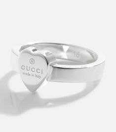 Pledge your love for Gucci with this sterling silver ring. Its heart detail is engraved with branding and a note about its Italian roots. We envision the understated design worn stacked alongside the house's more decadent accessories..Material: 925 sterling silver.Made in Italy.Designer color name: Argento.Max. width 10mm-0.4' Gucci Sterling Silver Ring, Gucci Fine Jewelry Ring For Anniversary, Classic Gucci Rings For Anniversary, Classic Gucci Ring Jewelry, Classic Gucci Ring, Classic Gucci Engraved White Gold Ring, Gucci Fine Jewelry White Gold Rings, Gucci White Gold Sterling Silver Ring, Gucci White Gold Fine Jewelry Ring