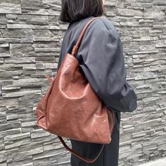 MATERIAL - Made of 100% high quality full-grain leather (Italy vegetable-tanned leather), solid color, feels cosy to touch,delicate, durable. The hardware parts are made of cast molding thick hardware, top metal hardware. The stitching is well-made, firm and smooth. YKK zipper.DIMENSIONS - 12.6L*5.5W*12.6H(inch) / 32L*14W*32H(cm)STRUCTURE - This tote bag contains 2 main compartments, 1 inner slip pocket, 2 inner zipper pockets, 1 back zipper pocket. Comfortably holds book, iPad, wallet, mobile p Classic Leather Hobo Bag In Solid Color, Versatile Leather Shoulder Bag With Smooth Grain, Brown Textured Leather Hobo Bag For Business, Business Brown Textured Leather Hobo Bag, Office Bag With Smooth Grain, Office Bag With Solid Color And Smooth Grain, Solid Color Office Bag With Smooth Grain, Solid Smooth Grain Office Bag, Versatile Leather Hobo Bag For Office