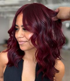 Image 1 of 1 Plum Hair With Red Highlights, Burgundy Hair With Lowlights, Medium Dark Red Hair, Makeup For Burgundy Hair, Deep Cherry Red Hair Burgundy, Mahagoni Hair Color, Raspberry Hair Color, Red Brown Highlights, Burgundy Hair With Highlights