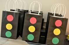 four bags with different colored traffic lights on them