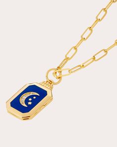 A true functioning locket, this 18-karat gold charm decorates its blue enamel cover with a celestial motif and shimmering diamond details. From Syna Jewels’ Cosmic Collection, a celebration of our infinite potential and universal interconnectedness.Pendant only, chain not included18k yellow gold, enamel and diamondCarat: 0.07 ctwDiamond cut: round brilliantDiamond color: IDiamond clarity: SI2Polish with soft clothMaterials sourced from IndiaMade in Thailand Measurements Width: 0.6in Length: 1.3i Luxury Celestial Enamel Jewelry, Luxury Fine Jewelry With Star Charm, Diamond Locket, Lapis Blue, Locket Charms, Diamond Carat, Moon Stars, Women Diamond, Gold Enamel