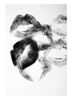 black and white photograph of three different lips