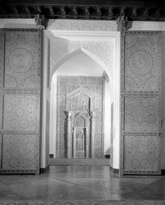 black and white photograph of an archway in a building