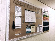 the bulletin board is covered with paper and magnets