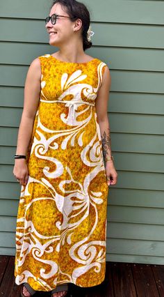 Vintage gorgeous 1960s-era maxi dress fro Malahini Designer's Collection, 100% cotton, made in Hawaii.  Princess styling, fit and flare, great 60s-era print.  A beautiful vintage maxi.   Freshly laundered and line-dried for you!  Approximate garment measurements laid flat (all measurements in INCHES): across shoulders: 15 across armpits: 17.5 waist: loose hips: loose front collar to bottom: 49  back collar to bottom: 46 across bottom: 52 Please note that our shipping prices include tracking, insurance, and assume "worst-case" - i.e., to the West Coast from our East Coast shop - we refund overestimations on shipping as per our Shipping Policies.  We ship to most countries - convo us for combined or non-US shipping rates. For more fab vintage clothes and shoes, check out the rest of our shop Retro A-line Maxi Dress, Retro Maxi Dress For Beach, Retro Cotton Maxi Dress, Vintage Maxi Dress With Retro Print, Yellow Retro Maxi Dress, 1970s Cotton Dress With Retro Print, 1970s Retro Print Cotton Dress, Retro Yellow Maxi Dress, Yellow Cotton Retro Vintage Dress