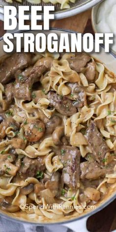 beef stroganoni with mushrooms in a skillet