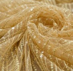 "Gold lace fabric /Sequin lace fabric for evening dress /Golden fabric By the yard /Paillette Shine fabric lace /Length 1yard /WIDTH 55''lace Composition: polyester Length 1 yard WIDTH: 1.40 (55\") 2 colors available : 1)Off white 2)Gold Note that each monitor has a different color rendition. The color in reality can be a little different! We invite to cooperation on special conditions, designers of clothes and ateliers See lace in other categories: 1) Chantilly lace here https://etsy.me/2H3gqTg Festive Party Sequin Lace Fabric, Gold Lace Sequin Fabric For Party, Beige Lace Embroidered Fabric For Party, Beige Embroidered Lace Fabric For Party, Gold Lace Tulle Fabric With Sequins, Sequin Fabric With Lace Work For Festive Party, Party Embroidered Sequin Net Fabric, Gold Lace Fabric, Golden Fabric