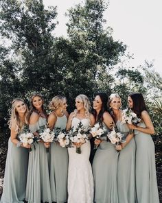 a group of women standing next to each other