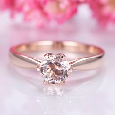 Morganite engagement ring rose gold plain band 14k solitaire gemstone ring 6.5mm round cut natural morganite six prongs set Valentine ITEM SPECIFICATIONS: Material:Solid gold (14k 18k rose gold,yellow gold,white gold available) Main Stone:with 6.5mm round cut 1ct natural morganite,clarity VS Band width(Bottom):approx 2mm Setting:Pave,prongs Our Service: All sizes available,please feel free to contact me if you need another ring sizes. Craft Period:Because all of rings are handmade to orders,it t Classic Morganite Diamond Ring With Round Cut, Classic Morganite Solitaire Rings, Morganite Round Ring For Promise, Morganite Brilliant Cut Diamond Ring, Rose Gold Morganite Ring With Prong Setting, Morganite Solitaire In Rose Gold, Classic Rose Gold Morganite Wedding Ring, Rose Gold Sapphire Ring With Round Cut Center Stone, Morganite Round Cut Promise Ring