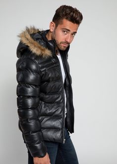 Men's Winter Black Puffer Real Leather Jacket with artificial down.  Made with Ultra Premium 100% Real Soft and Supple Lambskin Leather. Mid-Length Jacket with Fur lining on hoodie. Detachable Hoodie by Zipper. Filled with artificial down in for cold weather protection.  Great for jacket for casual and party wear.    Model is   6'   / 1  83  cm and is wearing size US   Medium Leather Jacket With Fur, Unique Fashion Jewelry, Jacket With Fur, Fur Leather Jacket, Real Leather Jacket, American Brand, Black Puffer, Black Leather Jacket, Faux Leather Jackets