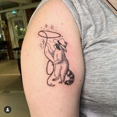 a person with a tattoo on their arm