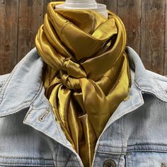 Our classic wild rag/scarf in solid mustard yellow color. A perfect square - measuring 35"x35". Adding that extra touch of a western style to your outfit. 100% soft silk feeling polyester is durable to keep you warm in the cold and fashionable for any occasion. Plus it's machine washable!  Additional accessories are available- (Please see our slide options on our site)  *Leather slides *Western concho slides *Crystal concho slide  *Buckle slides Classic Gold Silk Scarf, Classic Gold Silk Scarf For Formal Occasions, Leather Cowgirl Boots, Mustard Yellow Color, Perfect Squares, Wild Rag, Rodeo Drive, Designer Scarves, Bow Sneakers